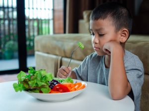 A child being a picky eater