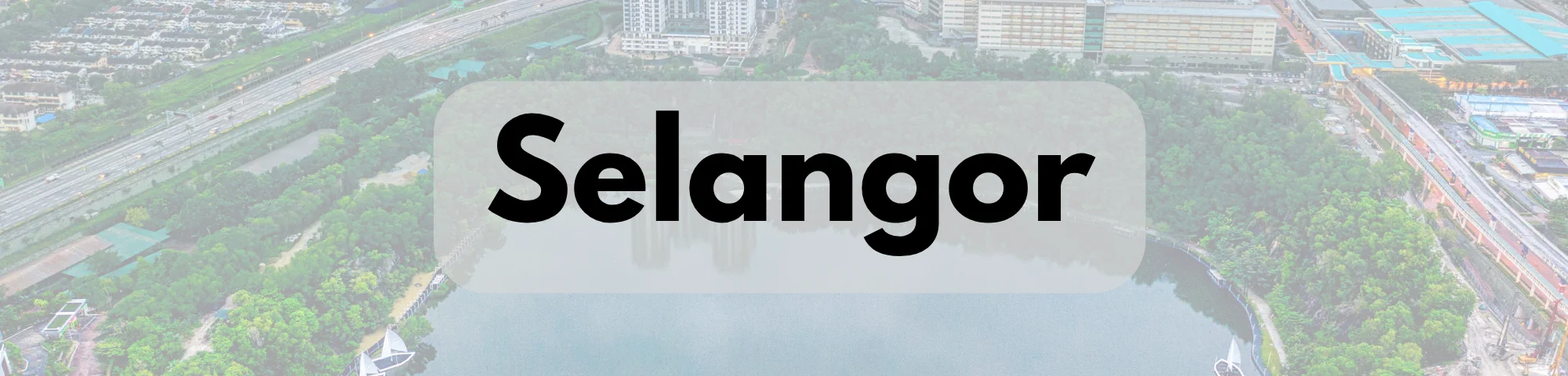 A banner featuring an aerial view of a lake surrounded by lush greenery and urban buildings. The center displays the word "Selangor" in bold black text on a semi-transparent gray rounded rectangle.